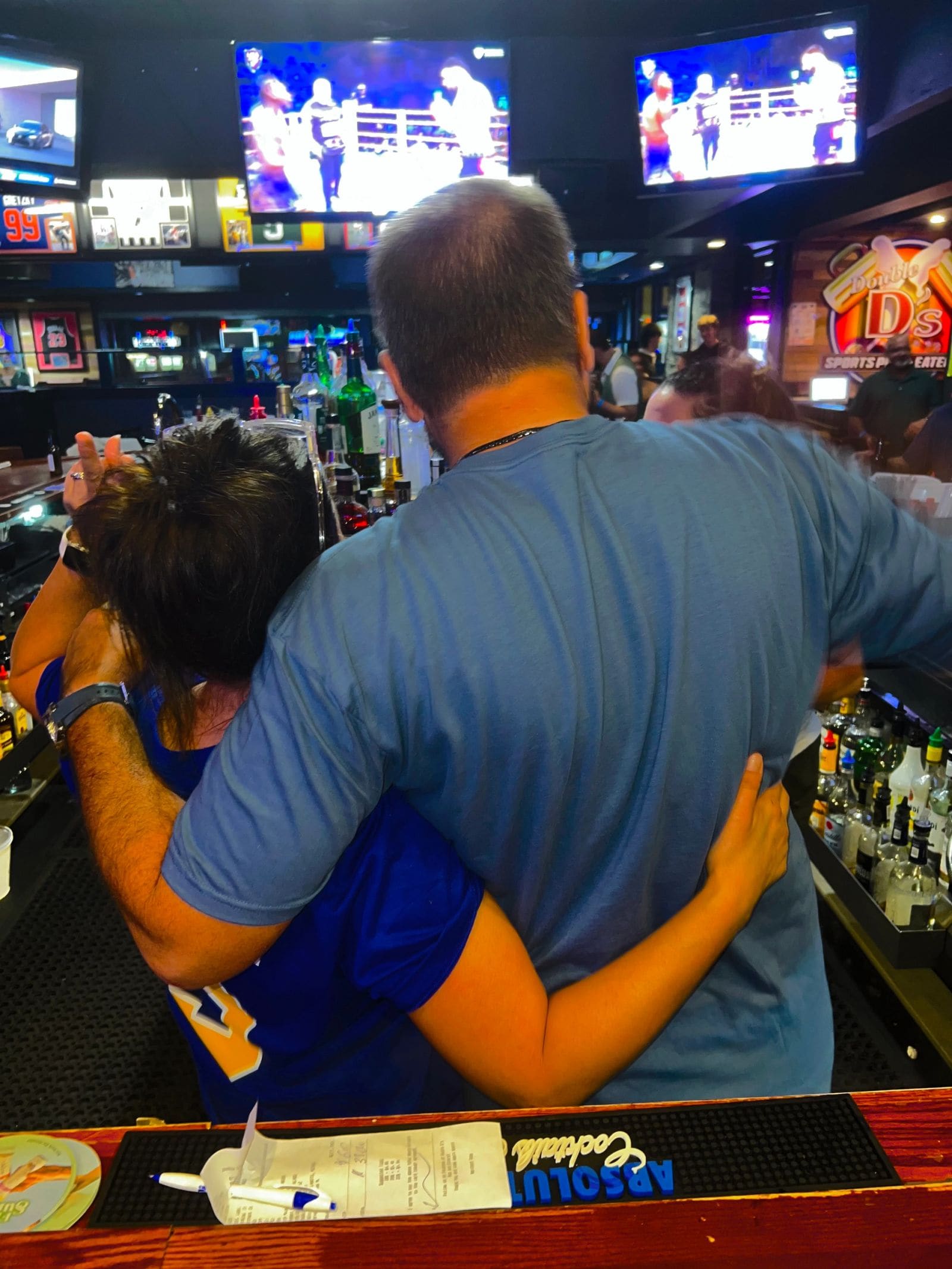 Happy guests at Double D's during a big game
